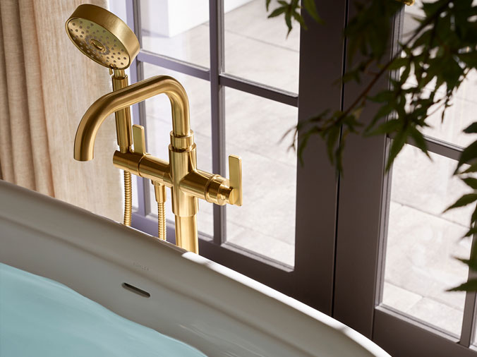 Brass free standing bathtub faucet and attached shower head