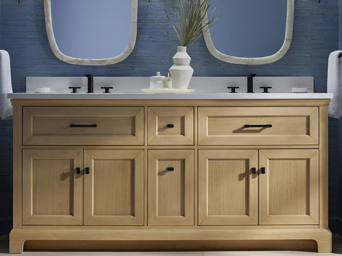 Lite wood bathroom vanity with dual sinks with black faucets