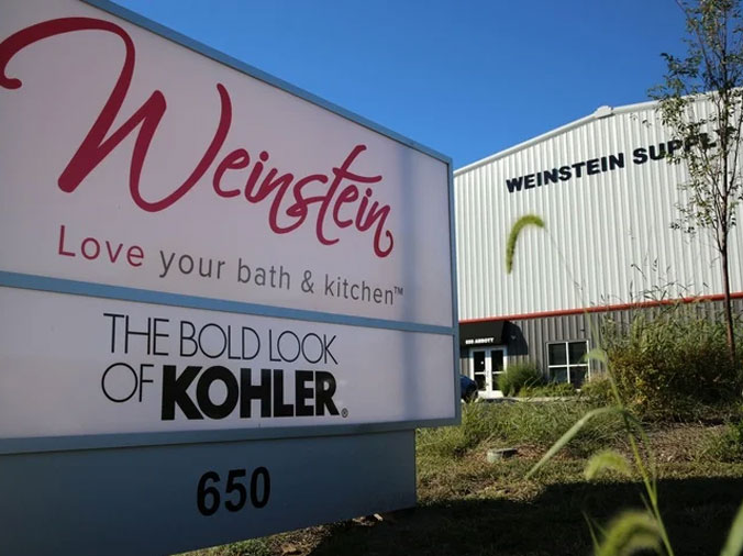 Weinstein Broomall exterior sign with building in background